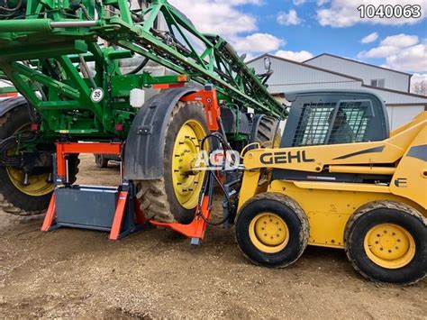 tire changing skid steer attachment|Large Tire Changer .